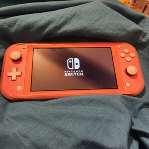 Coral (Pink) Nintendo Switch Lite with Glitter Case & Charger